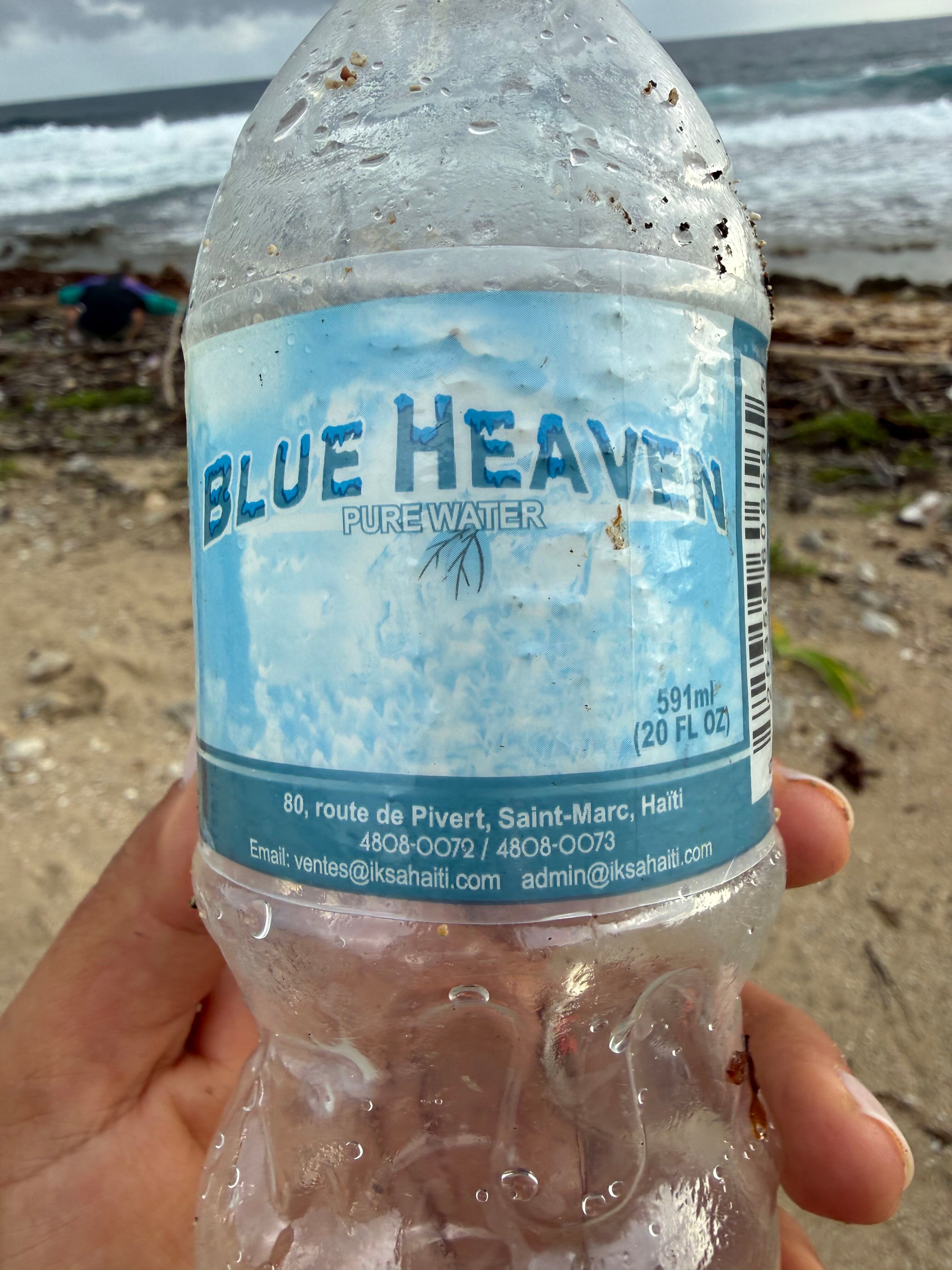 Blue Heaven pure water bottle from Haiti found on Utila.