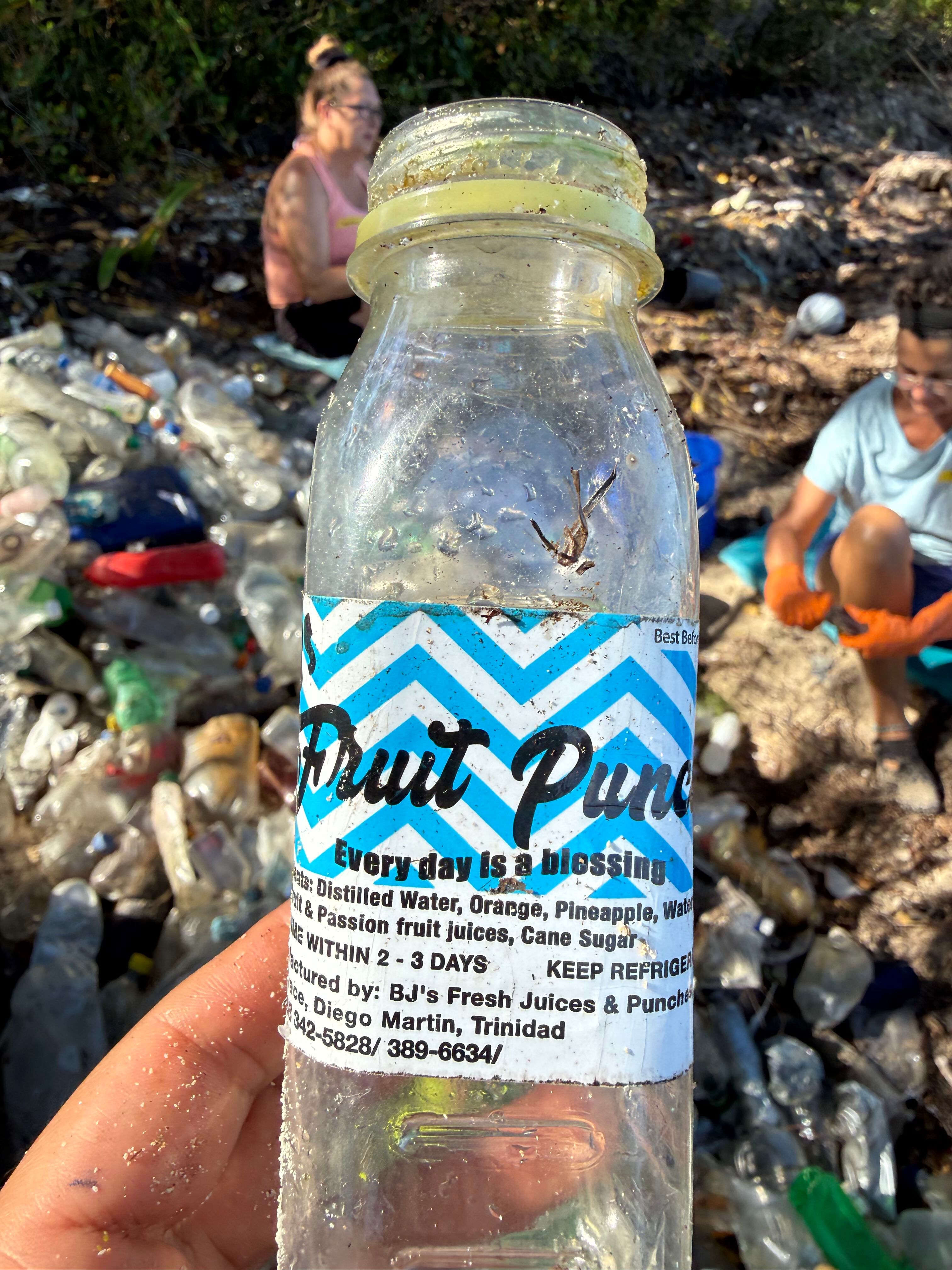 Fruit punch bottle from Trinidad found in Utila trash pile.